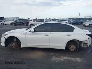 2014 Infiniti Q50 Premium with VIN JN1BV7AP3EM681742, listed as a IAAI auction lot 40342929 with 136,412 mi miles. Bid and sale history available at carsss.com. Image 15.