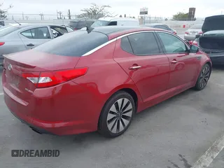 2012 Kia Optima SX z VIN 5XXGR4A64CG019121, wystawiony jako IAAI lot #42426482 z przebiegiem 137 496 mil mil oraz . Historia ofert i sprzedaży dostępna na DreamBid. Obrazek 4.
