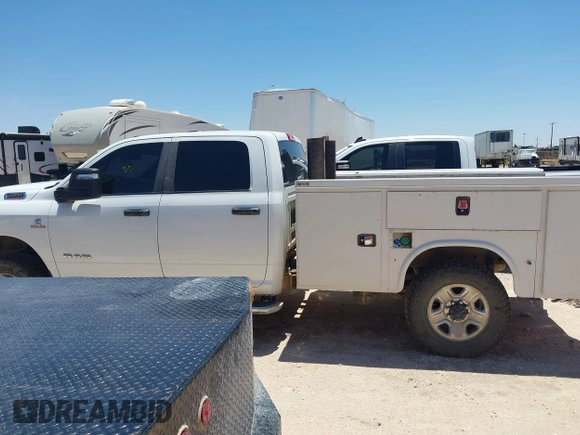 2023 Ram 2500 Big Horn with VIN 3C6UR5JL1PG651289, listed as a IAAI auction lot 42460464 with 65,567 mi miles and . Bid and sale history available at DreamBid. Image 13.