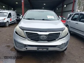 2012 Kia Sportage LX with VIN KNDPB3A27C7290386, listed as a IAAI auction lot 41634101 with 116,807 mi miles. Bid and sale history available at carsss.com. Image 12.