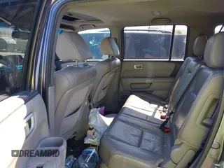 2014 Honda Pilot EX-L with VIN 5FNYF3H52EB015806, listed as a IAAI auction lot 41676586 with 193,215 mi miles and . Bid and sale history available at carsss.com. Image 8.