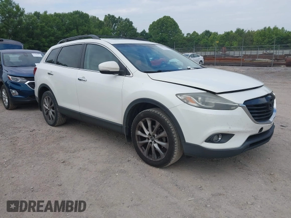 2015 Mazda CX-9 Grand Touring with VIN JM3TB2DA7F0448886, listed as a IAAI auction lot 42440203 with 108,765 mi miles and . Bid and sale history available at DreamBid. Image 1.