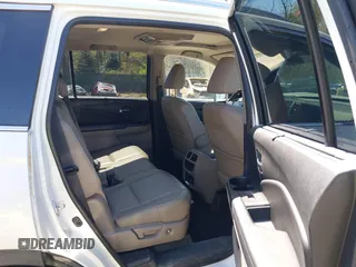 2016 Honda Pilot Touring with VIN 5FNYF6H9XGB005516, listed as a IAAI auction lot 41975049 with 85,217 mi miles. Bid and sale history available at carsss.com. Image 8.