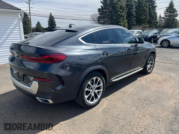 2021 BMW X6 xDrive40i z VIN 5UXCY6C02M9D88338, wystawiony jako Copart lot #50947775 z przebiegiem 116 477 mil mil oraz Czysty tytuł • Clean title. Historia ofert i sprzedaży dostępna na DreamBid. Obrazek 3.