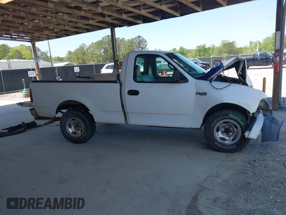 2000 Ford F-150 XL with VIN 1FTZF1724YNA84616, listed as a IAAI auction lot 41999334 with Not provided miles and . Bid and sale history available at DreamBid. Image 14.