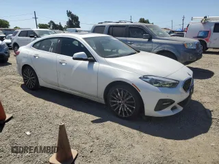 2020 BMW 2 Series 228i xDrive with VIN WBA73AK02L7F72756, listed as a Copart auction lot 59174455 with 60,415 mi miles and Salvage title. Bid and sale history available at DreamBid. Image 4.