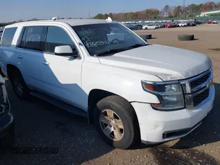 2018 Chevrolet Tahoe Commercial z VIN 1GNSKDEC9JR219377, wystawiony jako IAAI lot #40880341 z przebiegiem Nie podano mil oraz . Historia ofert i sprzedaży dostępna na DreamBid. Obrazek 1.