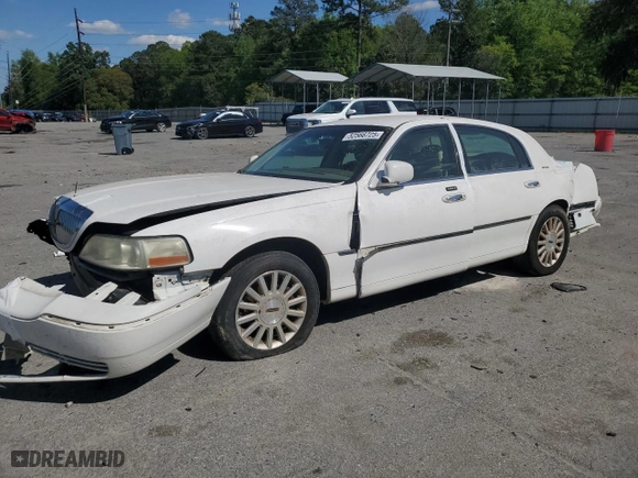 2004 Lincoln Town Car Signature with VIN 1LNHM81W04Y603672, listed as a Copart auction lot 52566725 with 214,180 mi miles and Salvage Title. Bid and sale history available at carsss.com. Image 1.