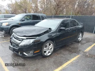 2012 Ford Fusion SPORT with VIN 3FAHP0KC0CR176529, listed as a IAAI auction lot 40971678 with 164,121 mi miles. Bid and sale history available at carsss.com. Image 2.