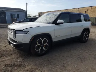 2023 Rivian R1S Adventure z VIN 7PDSGABA3PN016604, wystawiony jako Copart lot #55323005 z przebiegiem 36 055 mil mil oraz Szkoda całkowita • Salvage title. Historia ofert i sprzedaży dostępna na DreamBid. Obrazek 1.