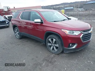 2019 Chevrolet Traverse LT Leather with VIN 1GNEVHKW1KJ164692, listed as a IAAI auction lot 41800874 with 76,866 mi miles. Bid and sale history available at carsss.com. Image 1.