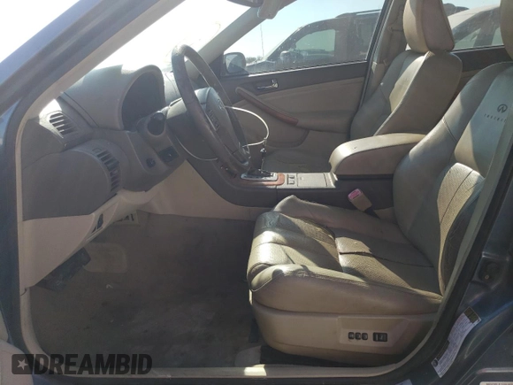 2006 Infiniti G35 with VIN JNKCV51F06M603920, listed as a Copart auction lot 74150574 with 210,890 mi miles and Salvage Title. Bid and sale history available at DreamBid. Image 7.