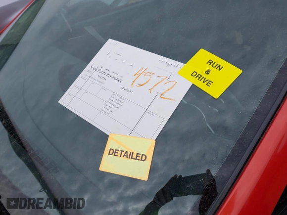2012 Mazda 3 S Grand Touring with VIN JM1BL1W53C1658421, listed as a IAAI auction lot 41294572 with 100,875 mi miles and . Bid and sale history available at DreamBid. Image 18.