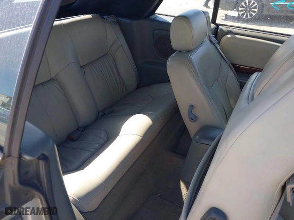 1999 Chrysler Sebring Jxi with VIN 3C3EL55H6XT603058, listed as a IAAI auction lot 41774322 with 157,852 mi miles. Bid and sale history available at carsss.com. Image 8.