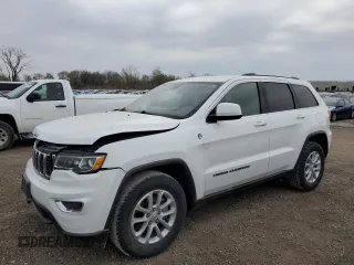 2021 Jeep Grand Cherokee Laredo X with VIN 1C4RJFAG4MC809721, listed as a Copart auction lot 53433595 with 136,257 mi miles and Salvage title. Bid and sale history available at DreamBid. Image 1.