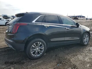 2021 Cadillac XT5 FWD Premium Luxury with VIN 1GYKNCRS1MZ107036, listed as a Copart auction lot 45534075 with 66,813 mi miles and Salvage Title. Bid and sale history available at carsss.com. Image 3.