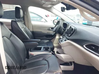 2023 Chrysler Pacifica Hybrid Touring L with VIN 2C4RC1L70PR622000, listed as a IAAI auction lot 42711826 with 65,109 mi miles and . Bid and sale history available at DreamBid. Image 5.