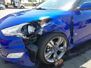 2013 Hyundai Veloster w/Black Int with VIN KMHTC6AD6DU143974, listed as a IAAI auction lot 42164745 with 136,195 mi miles and . Bid and sale history available at DreamBid. Image 6.