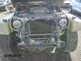 2013 Jeep Wrangler Unlimited Rubicon 10th Anniversary with VIN 1C4HJWFG4DL549065, listed as a Copart auction lot 75899594 with 127,960 mi miles and Salvage title. Bid and sale history available at DreamBid. Image 11.