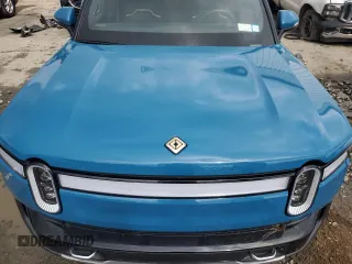 2023 Rivian R1T Adventure with VIN 7FCTGBAA5PN026063, listed as a Copart auction lot 66916194 with Not Provided miles and Salvage Title. Bid and sale history available at DreamBid. Image 11.