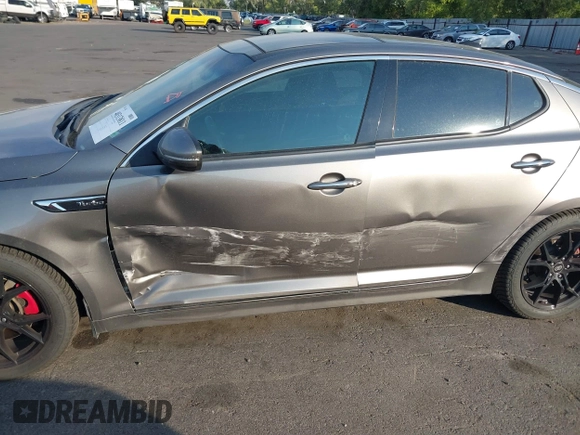 2015 Kia Optima SX Turbo with VIN 5XXGR4A61FG395148, listed as a IAAI auction lot 40313811 with 104,978 mi miles and . Bid and sale history available at DreamBid. Image 6.