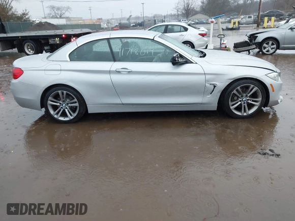 2014 BMW 4 Series 428i with VIN WBA3V5C51EJ968657, listed as a IAAI auction lot 41718019 with 111,083 mi miles and . Bid and sale history available at DreamBid. Image 13.