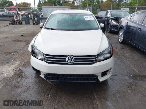 2013 Volkswagen Passat SE with VIN 1VWBH7A36DC110720, listed as a IAAI auction lot 41997869 with 114,246 mi miles and . Bid and sale history available at DreamBid. Image 12.