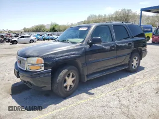 2002 GMC Yukon Denali z VIN 1GKEK63U62J241161, wystawiony jako Copart lot #58350085 z przebiegiem Nie podano mil oraz Szkoda całkowita • Salvage title. Historia ofert i sprzedaży dostępna na DreamBid. Obrazek 1.