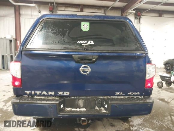 2017 Nissan Titan Pro-4X z VIN 1N6BA1F44HN551551, wystawiony jako IAAI lot #41581877 z przebiegiem 64 834 mil mil oraz . Historia ofert i sprzedaży dostępna na DreamBid. Obrazek 17.
