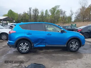 2018 Toyota RAV4 LE with VIN JTMBFREV8JJ220630, listed as a IAAI auction lot 42001795 with 86,027 mi miles. Bid and sale history available at carsss.com. Image 13.