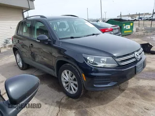 2018 Volkswagen Tiguan with VIN WVGBV7AX3JK002325, listed as a IAAI auction lot 41960059 with 57,619 mi miles and . Bid and sale history available at DreamBid. Image 1.