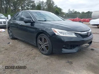 2016 Honda Accord Touring z VIN 1HGCR3F94GA021952, wystawiony jako IAAI lot #41812444 z przebiegiem 209 795 mil mil oraz . Historia ofert i sprzedaży dostępna na DreamBid. Obrazek 1.