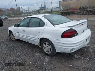 1999 Pontiac Grand Am SE1 with VIN 1G2NE52EXXM781713, listed as a IAAI auction lot 41914492 with 148,435 mi miles. Bid and sale history available at carsss.com. Image 3.