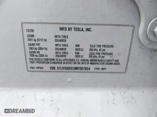 2021 Tesla Model Y Long Range with VIN 5YJYGDEE3MF087054, listed as a IAAI auction lot 41728040 with 64,228 mi miles. Bid and sale history available at carsss.com. Image 9.