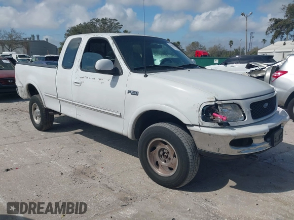 1997 Ford F-150 XL with VIN 1FTDX1868VKA12923, listed as a IAAI auction lot 41526986 with 343,755 mi miles. Bid and sale history available at carsss.com. Image 1.