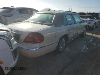 2002 Lincoln Continental with VIN 1LNHM97V32Y694132, listed as a Copart auction lot 76410144 with 0 mi miles and Non Repairable. Bid and sale history available at carsss.com. Image 3.