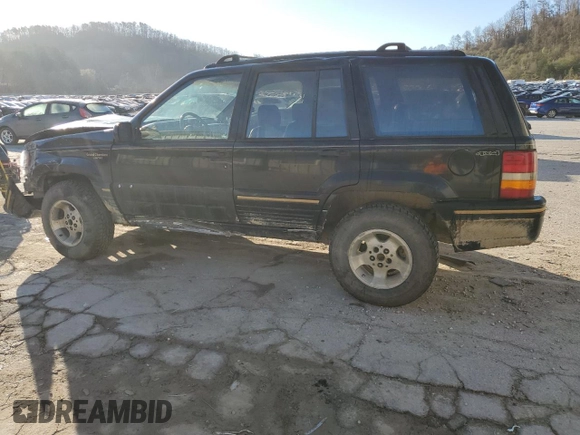 1994 Jeep Grand Cherokee Limited with VIN 1J4GZ78S0RC357283, listed as a Copart auction lot 49236995 with 84,306 mi miles and Salvage title. Bid and sale history available at DreamBid. Image 2.