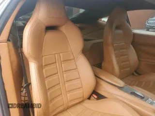 2013 Ferrari F12 z VIN ZFF74UFA7D0193622, wystawiony jako Copart lot #51904615 z przebiegiem Nie podano mil oraz Szkody całkowita. Historia ofert i sprzedaży dostępna na DreamBid. Obrazek 10.