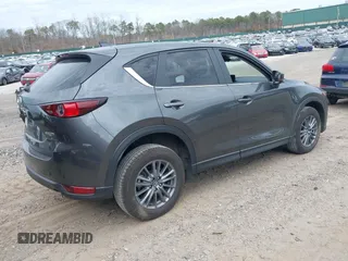 2021 Mazda CX-5 Touring with VIN JM3KFBCM8M0492145, listed as a IAAI auction lot 39077248 with 20,408 mi miles. Bid and sale history available at carsss.com. Image 4.