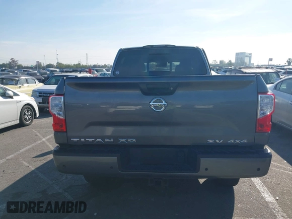2021 Nissan Titan SV with VIN 1N6AA1FA6MN529806, listed as a IAAI auction lot 41859992 with 50,729 mi miles and . Bid and sale history available at DreamBid. Image 16.