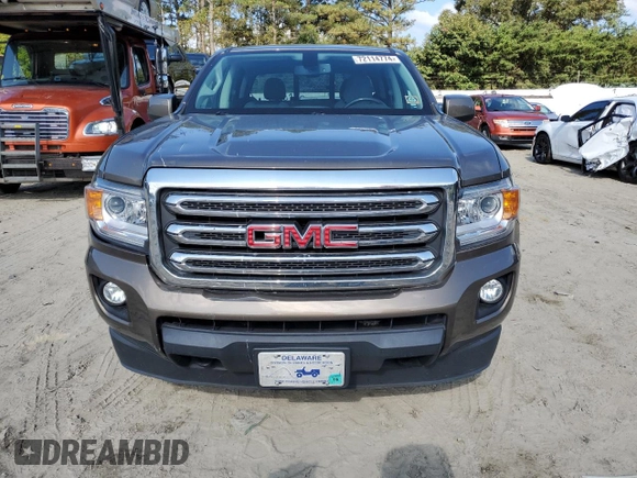 2016 GMC Canyon 4WD SLE with VIN 1GTG6CE38G1293670, listed as a Copart auction lot 72114774 with 125,659 mi miles and Salvage Title. Bid and sale history available at carsss.com. Image 5.