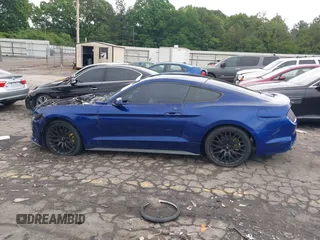 2015 Ford Mustang V6 with VIN 1FA6P8AM2F5321402, listed as a IAAI auction lot 42215558 with 137,209 mi miles and . Bid and sale history available at DreamBid. Image 14.