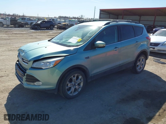 2013 Ford Escape SEL with VIN 1FMCU9HX2DUA71931, listed as a IAAI auction lot 41757318 with 149,344 mi miles. Bid and sale history available at carsss.com. Image 17.