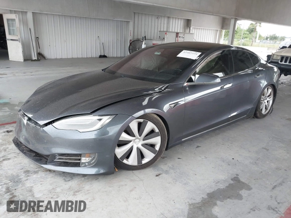 2021 Tesla Model S Long Range Plus with VIN 5YJSA1E28MF421655, listed as a IAAI auction lot 42407234 with 111,443 mi miles and . Bid and sale history available at DreamBid. Image 17.