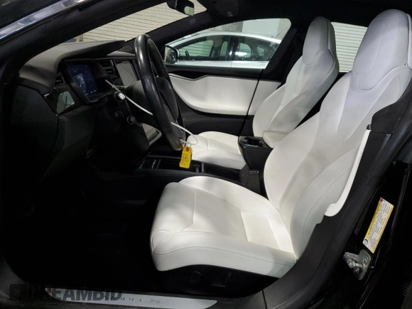 2019 Tesla Model S 75D z VIN 5YJSA1E25KF310915, wystawiony jako Copart lot #58130705 z przebiegiem 61 330 mil mil oraz Szkoda całkowita • Salvage title. Historia ofert i sprzedaży dostępna na DreamBid. Obrazek 7.