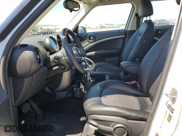 2015 MINI Countryman with VIN WMWZB3C55FWR44759, listed as a Copart auction lot 55836815 with 102,472 mi miles and Salvage title. Bid and sale history available at DreamBid. Image 7.