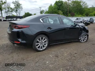 2021 Mazda 3 Select with VIN JM1BPBBL1M1326073, listed as a Copart auction lot 57518645 with 78,299 mi miles and Salvage title. Bid and sale history available at DreamBid. Image 3.