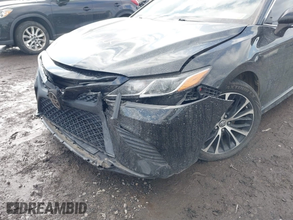 2018 Toyota Camry LE z VIN 4T1B11HK5JU649736, wystawiony jako IAAI lot #41536240 z przebiegiem 20 330 mil mil oraz . Historia ofert i sprzedaży dostępna na DreamBid. Obrazek 16.