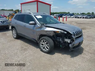 2018 Jeep Cherokee Latitude with VIN 1C4PJLCB2JD596149, listed as a IAAI auction lot 42454131 with 86,393 mi miles and . Bid and sale history available at DreamBid. Image 1.