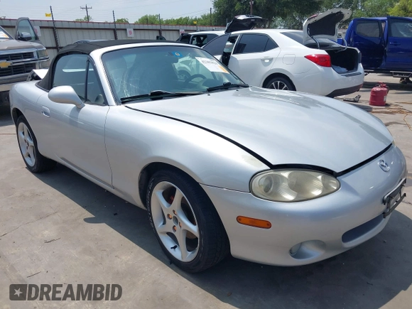 2002 Mazda MX-5 Miata Cloth z VIN JM1NB353020225252, wystawiony jako IAAI lot #42303820 z przebiegiem 194 549 mil mil oraz . Historia ofert i sprzedaży dostępna na DreamBid. Obrazek 1.